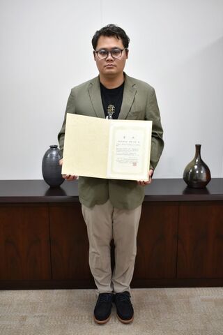 優秀発表賞を受賞